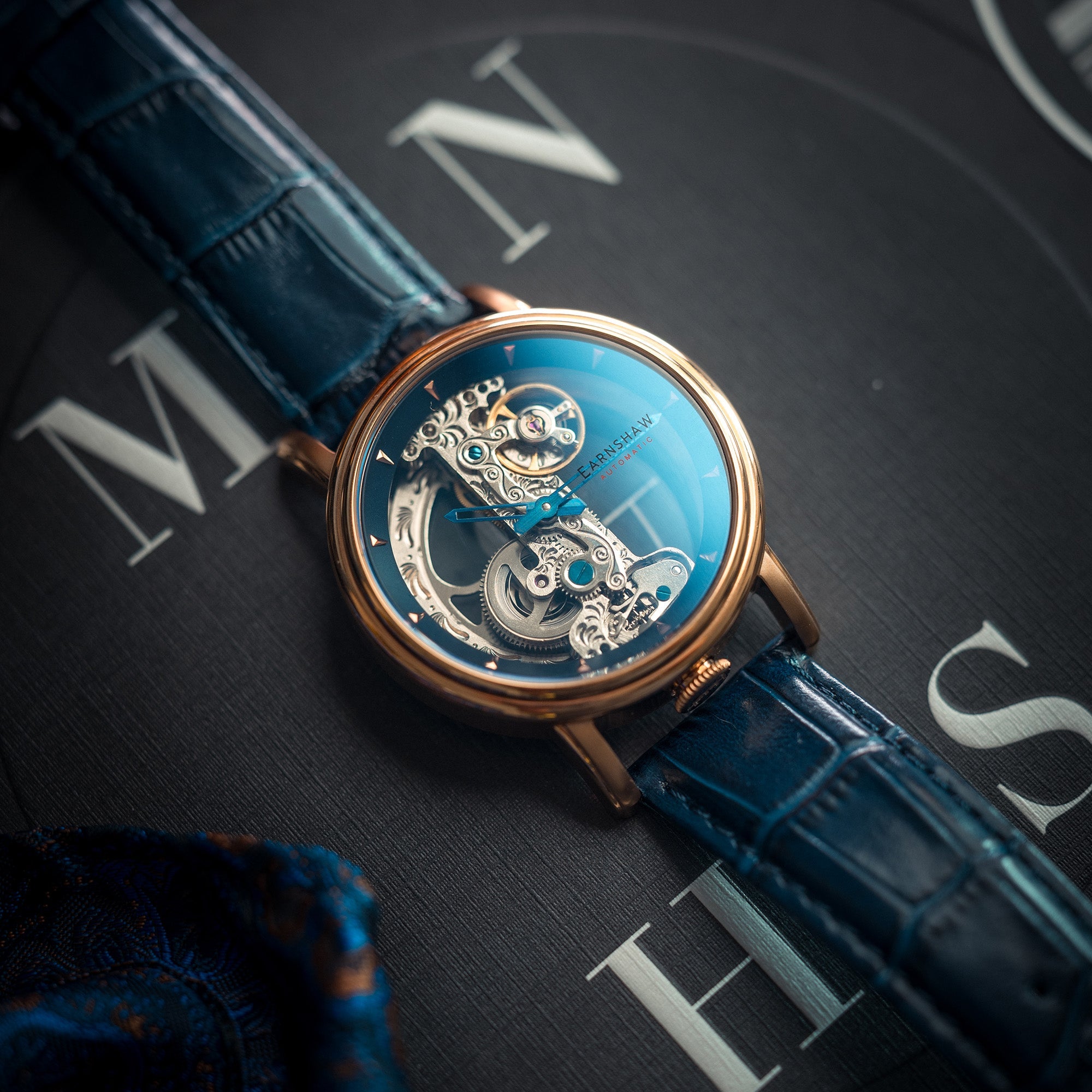 THOMAS EARNSHAW Thomas Earnshaw Fowler Bridge Men's Skeleton Blue Rose Gold Watch ES-8225-06